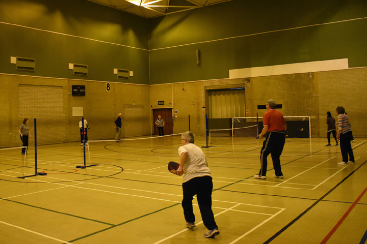 2 players playing Pickleball